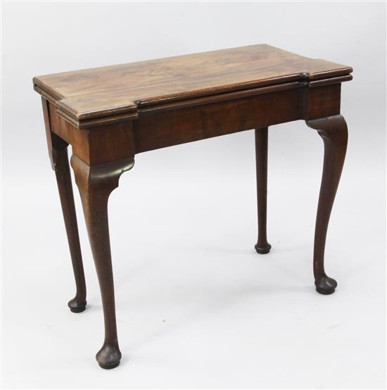 A George III mahogany folding card table, width 2ft 9in.
